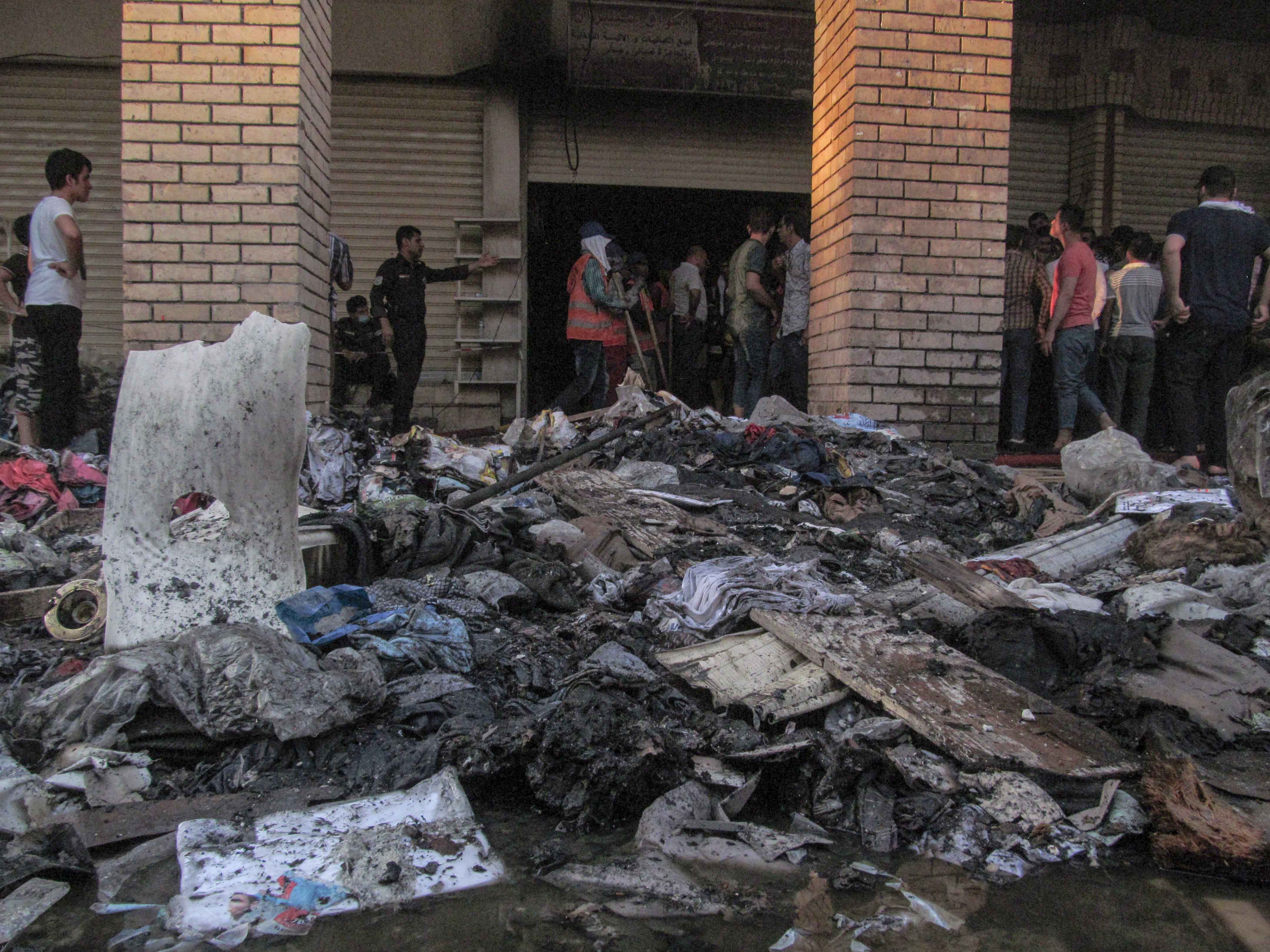 PHOTOS: Firefighters extinguish blaze in Erbil's old market 